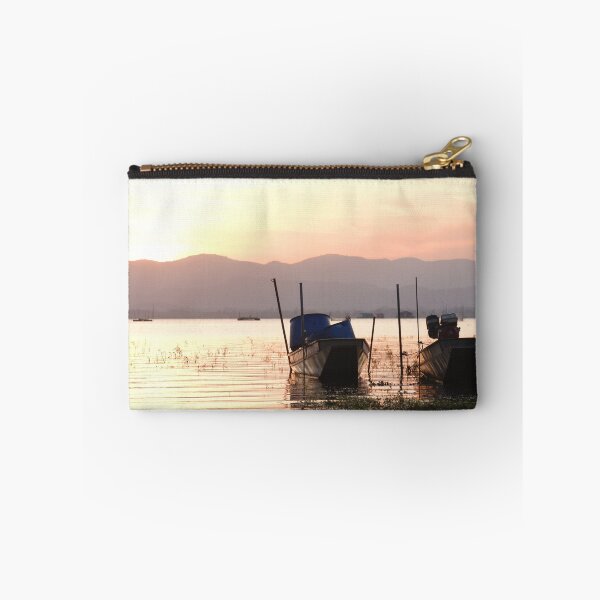 Item preview, Silhouette of a boat at sunset ,Dark and moody light , The background is a mountain view. designed and sold by ratchawoot.