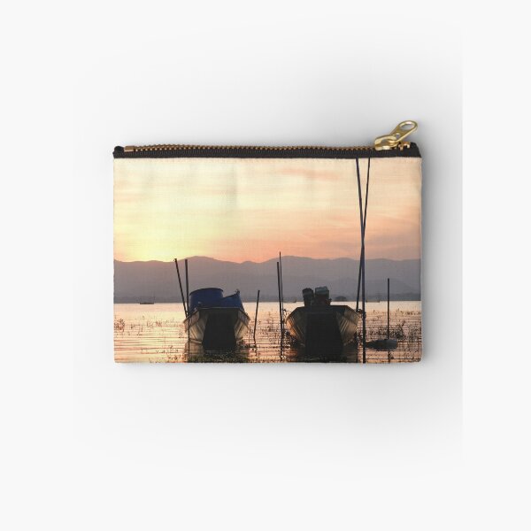 Item preview, Silhouette of a boat at sunset ,Dark and moody light , The background is a mountain view. designed and sold by ratchawoot.