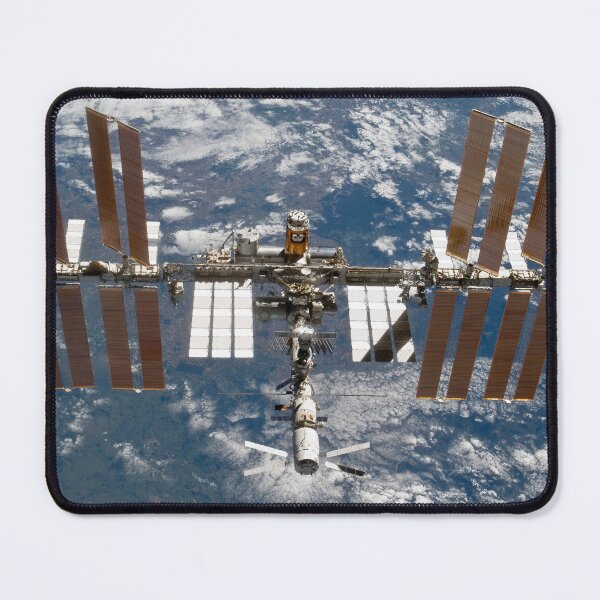 Item preview, STK204665S-International Space Station backdropped by a blue and white Earth. designed and sold by StocktrekImages.