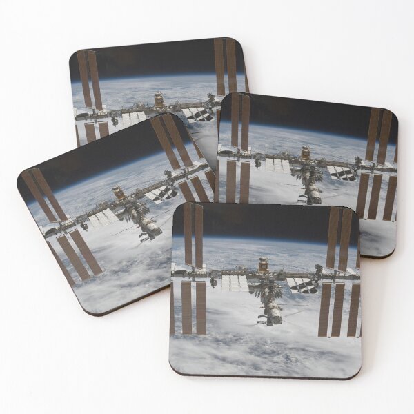 Item preview, STK204666S-International Space Station backdropped against clouds over Earth. designed and sold by StocktrekImages.