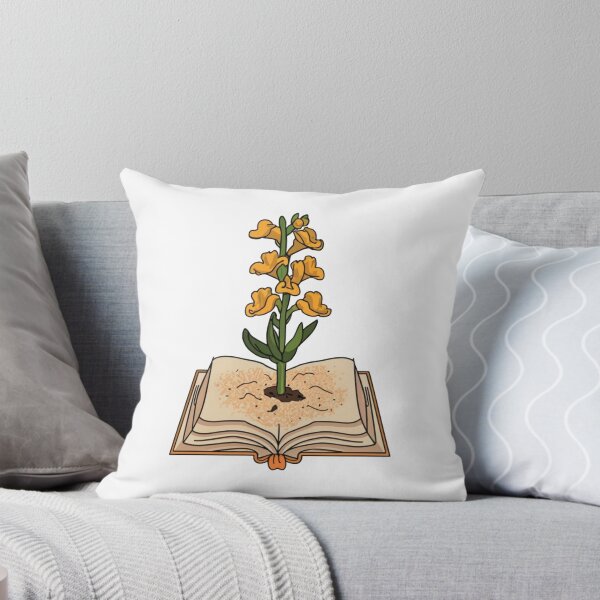 Item preview, Flowers Growing From Book | A beautiful light yellow  Antirrhinum majus designed and sold by CircinusStore.