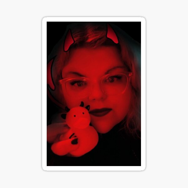 Red devil duck held by cute girl in dark background Sticker