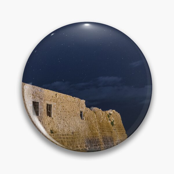 Item preview, A stone building with windows at night designed and sold by Tasos Karamalakis.