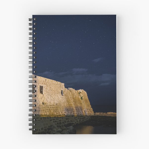 Item preview, A stone building with windows at night designed and sold by Tasos Karamalakis.