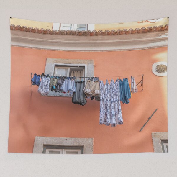 Item preview, Clothes lines on a terracotta building in Alfama, Lisbon, Portugal - colorful travel photography designed and sold by Christa Stroo Photography.