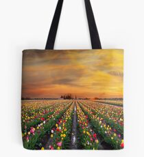 Sunset over colorful Tulip flower fields in full bloom during spring season tulip festival in Woodburn Oregon Tote Bag