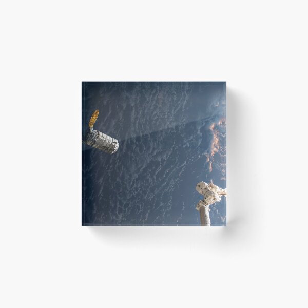 Item preview, STK204993S-Cygnus resupply spacecraft approaches the robotic arm. designed and sold by StocktrekImages.