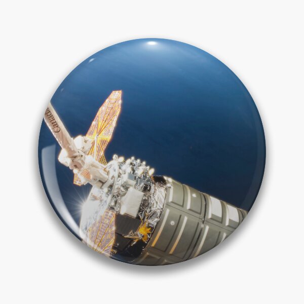 Item preview, STK204994S-Cygnus cargo spacecraft in the grips of the robotic arm above Earth. designed and sold by StocktrekImages.