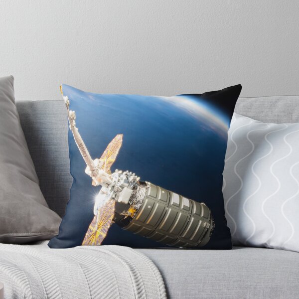 Item preview, STK204994S-Cygnus cargo spacecraft in the grips of the robotic arm above Earth. designed and sold by StocktrekImages.