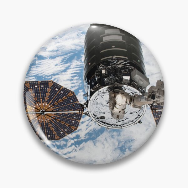 Item preview, STK204997S-Cygnus cargo spacecraft in the grips of the robotic arm above Earth. designed and sold by StocktrekImages.