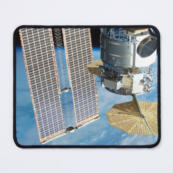 Item preview, STK204998S-Cygnus cargo spacecraft and ISS solar arrays above the South Atlantic Ocean. designed and sold by StocktrekImages.