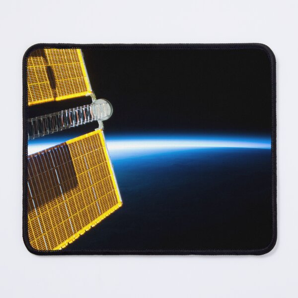 Item preview, STK205011S-Solar arrays backdropped by the blue glow of Earth's limb. designed and sold by StocktrekImages.