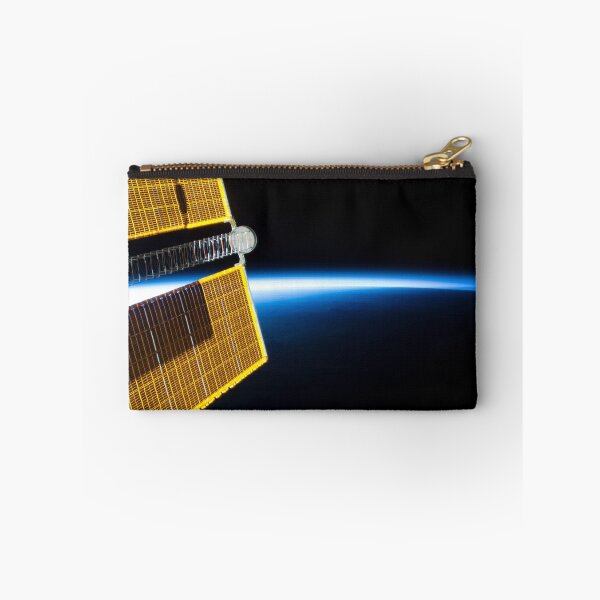 Item preview, STK205011S-Solar arrays backdropped by the blue glow of Earth's limb. designed and sold by StocktrekImages.