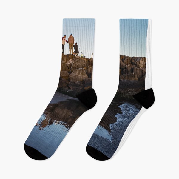 Item preview, Fishing on the Rocks at sunrise, A Serene and Peaceful photography designed and sold by nachodramis.