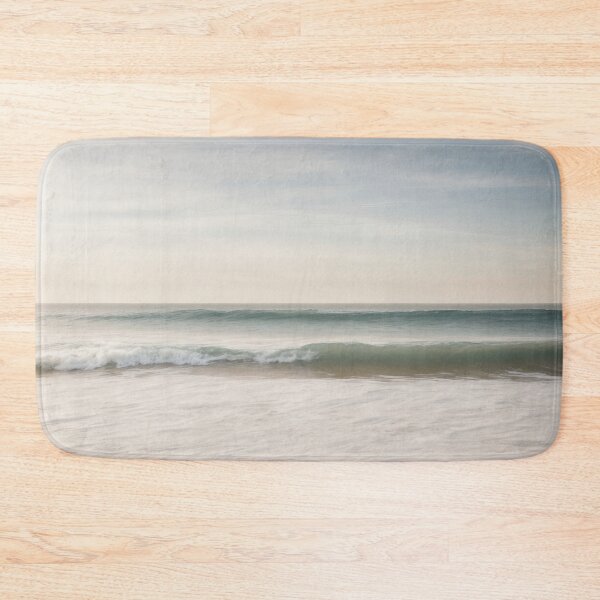 Item preview, A tranquil beach scene with gentle waves lapping against the sand designed and sold by Evolvity.