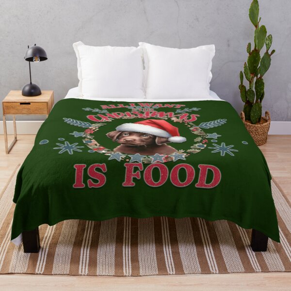 Item preview, Cute chocolate Labrador  puppy with a Santa hat. Text: 'All I want for Christmas is Food' designed and sold by shirtsmugslife.