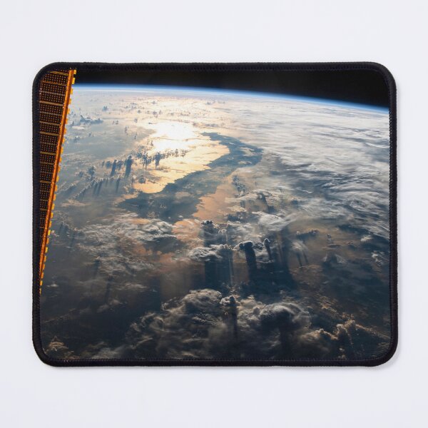 Item preview, STK205064S-The Sun's glint beams off the Celebes Sea in southeast Asia over Indonesia. designed and sold by StocktrekImages.