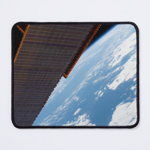 Item preview, STK205067S-A portion of the International Space Station's main solar arrays above the Pacific Ocean. designed and sold by StocktrekImages.