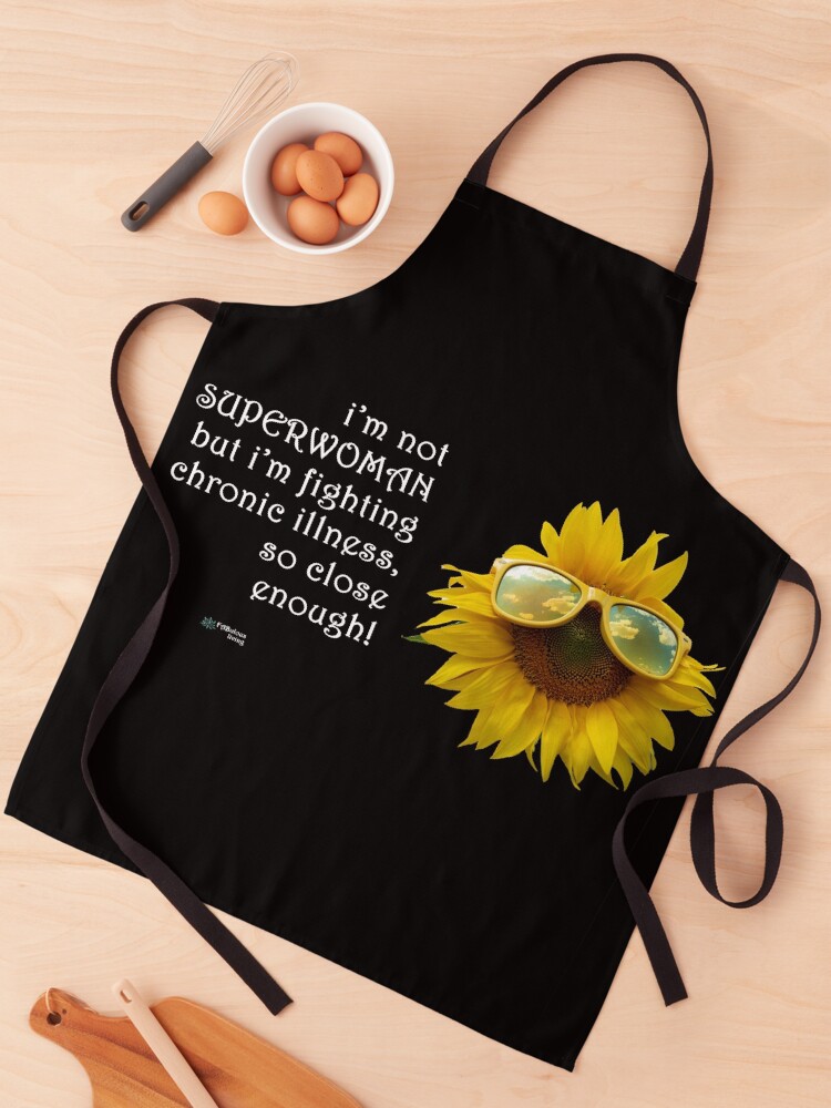 Thumbnail 1 of 6, Apron, Sunflower Sunglasses - SuperWoman Fighting Chronic Illness Quote designed and sold by FABulous-living.