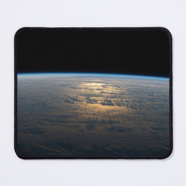 Item preview, STK205118S-The sun's glint beams off a partly cloudy South Pacific. designed and sold by StocktrekImages.