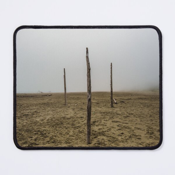 Item preview, Driftwood in a mystical arrangement on the foggy beach - photo designed and sold by CineWanderlust.