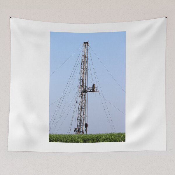 Item preview, oil drilling rig behind green wheat field designed and sold by goceris.