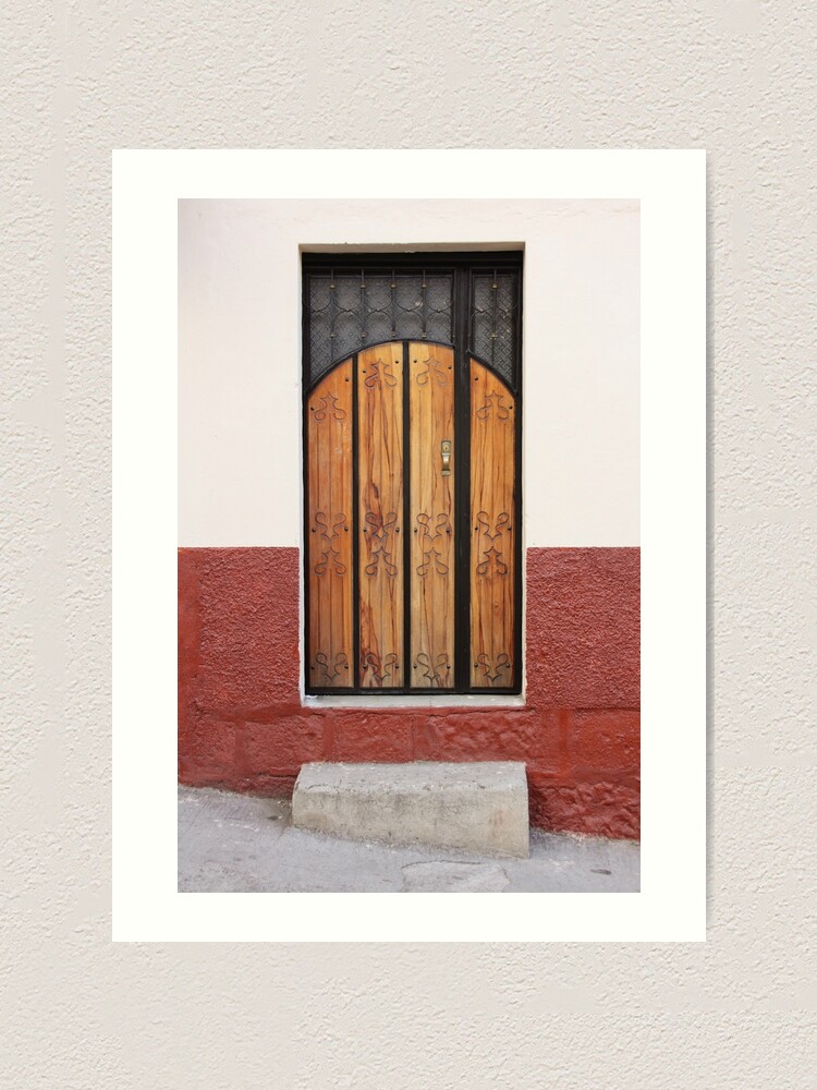 Alternate view of Wood panel door inset in stucco and concrete block stone wall with concrete step on incline Art Print