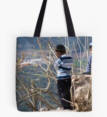 Children playing on the edge Tote Bag