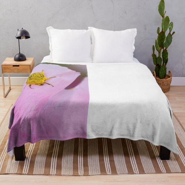 Item preview, A beetle insect covered in pollen walking on a pink petal. designed and sold by Giuseppe Cammino.