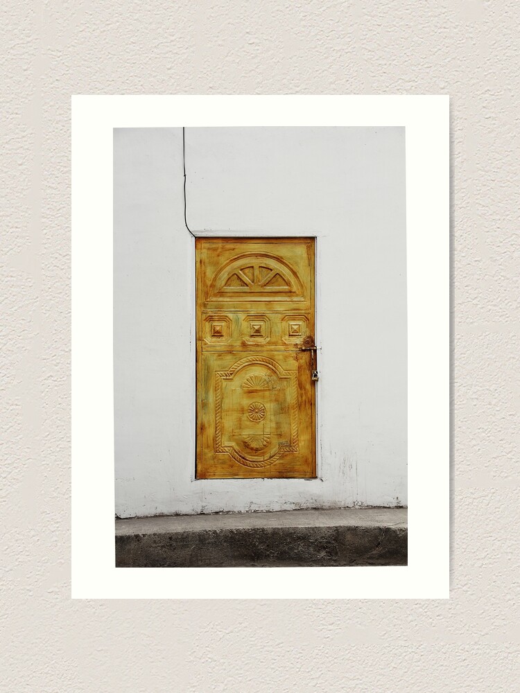 Alternate view of Golden yellow door in white wall Art Print
