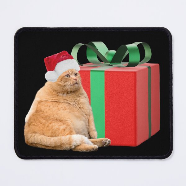 Item preview, A chubby ginger cat wearing a Christmas hat waiting for the celebration. designed and sold by attakorn.