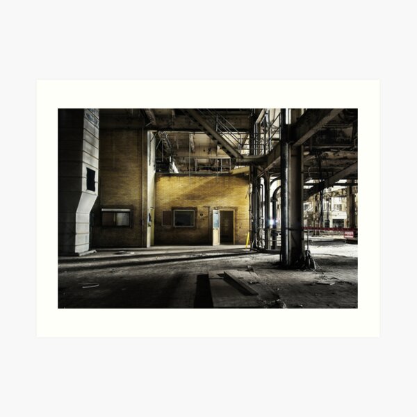 Yellow brick wall outside control room in abandoned industrial coal power station with open door and steel columns Art Print