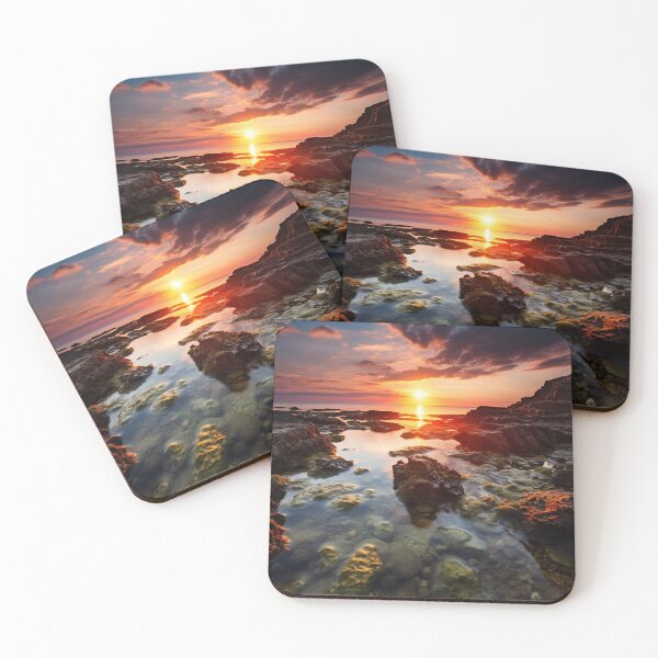 Item preview, Rocky beach at sunset in long exposure - Landscape photography designed and sold by TheArtistOf2022.