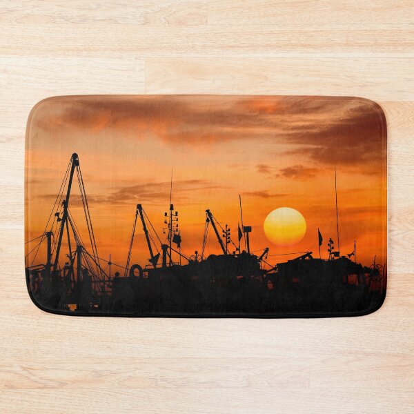 Item preview, A magnificent sunset and the silhouette of the boats in the harbor designed and sold by fotoryum.