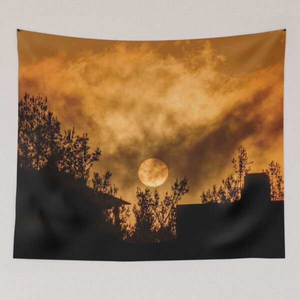 Item preview, Silhouette of houses and trees at sad and smoky sunset designed and sold by fotoryum.