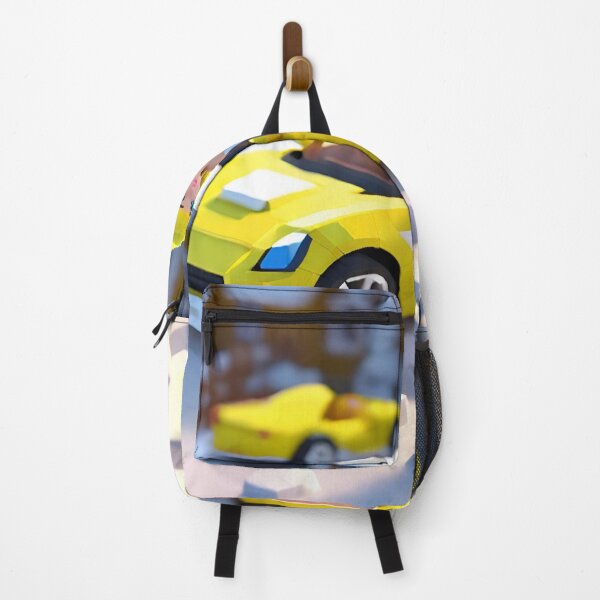Item preview, doll looking blonde girl wearing white mini dress standing in front of a yellow sports car parked in the snow designed and sold by thebitsinc.