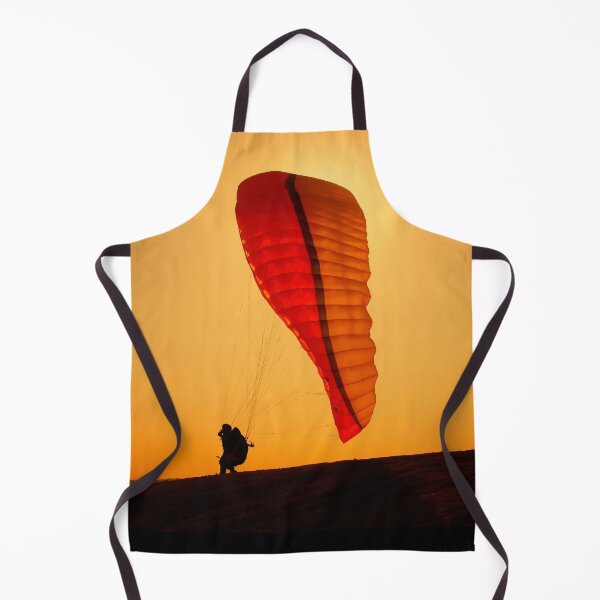 Item preview, A paraglider athlete running towards freedom on a windy sunset designed and sold by fotoryum.