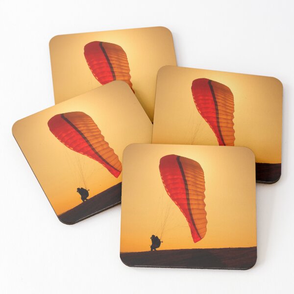 Item preview, A paraglider athlete running towards freedom on a windy sunset designed and sold by fotoryum.