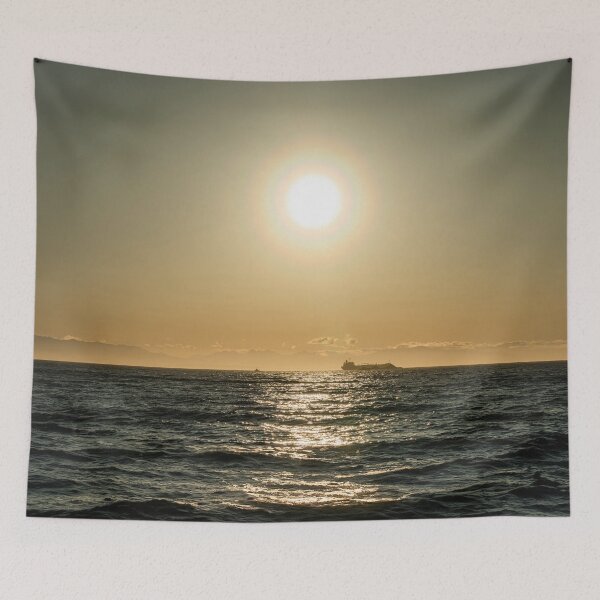 Item preview, A lonely container ship on the high seas at a golden sunset - photo designed and sold by CineWanderlust.