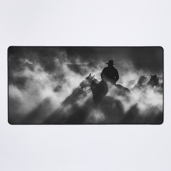 Item preview, A cowboy on a wild horse in front of dusty mountains (black and white) designed and sold by fotoryum.