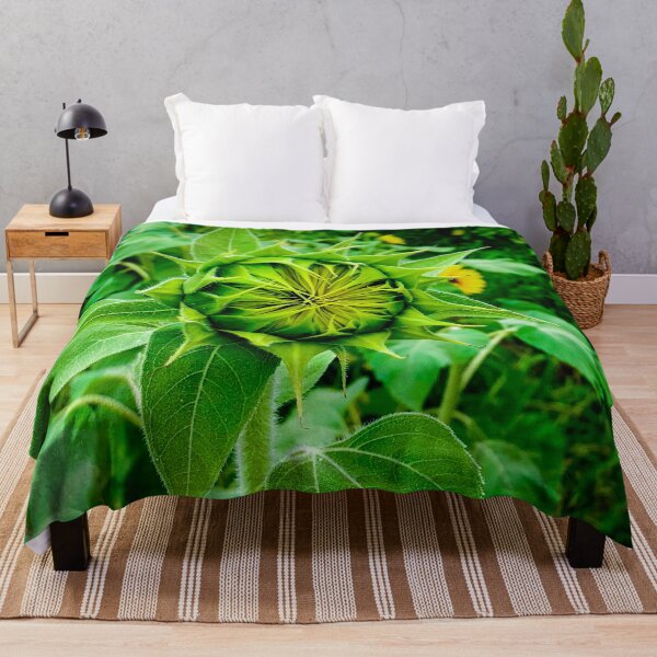 Item preview, Unfurling Potential: A Sunflower Bud Awaits designed and sold by Craig Kauzmann.