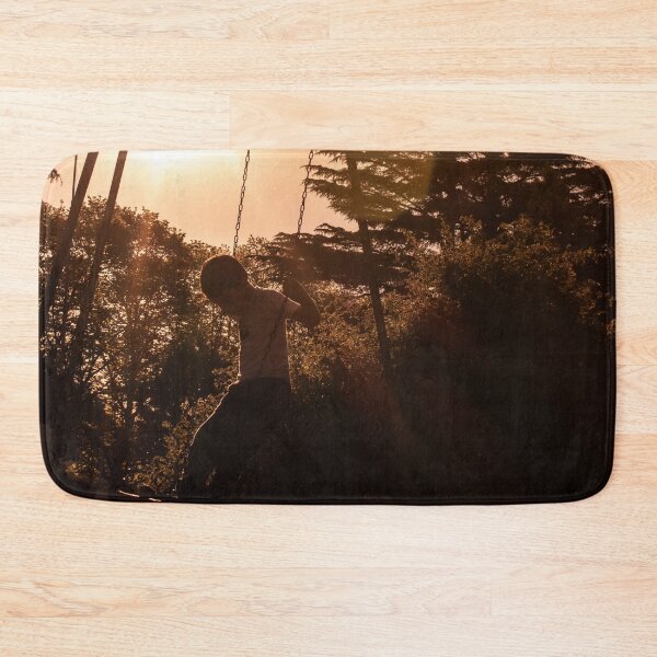 Item preview, Peaceful and carefree kid at the sunset swing photography designed and sold by nachodramis.