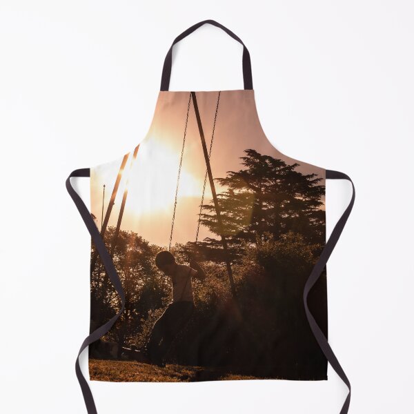 Item preview, Peaceful and carefree kid at the sunset swing photography designed and sold by nachodramis.