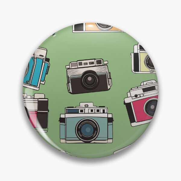 Item preview, Whimsical vintage drawings of 35mm film cameras on green background designed and sold by TheMoxieHouse.