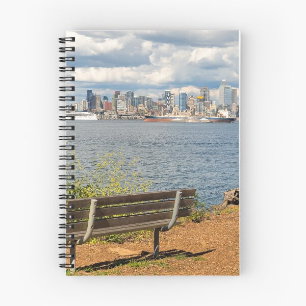 Item preview, View of Seattle WA city skyline along Elliott Bay by wooden bench in Alki Beach designed and sold by davidgnsx1.