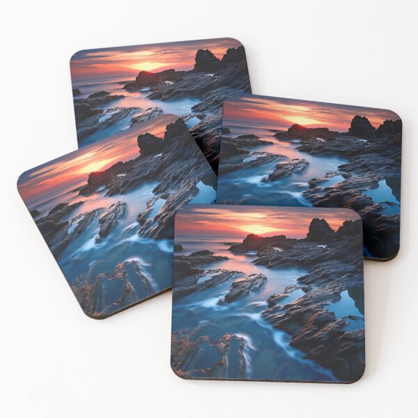 Item preview, Rocky beach at sunset in long exposure - Landscape photography designed and sold by TheArtistOf2022.