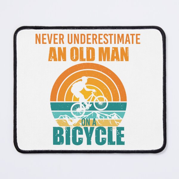 Item preview, never underestimate an old man on a bicycle designed and sold by TshirtTalkYou.