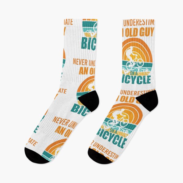 Item preview, never underestimate an old guy on a bicycle designed and sold by TshirtTalkYou.