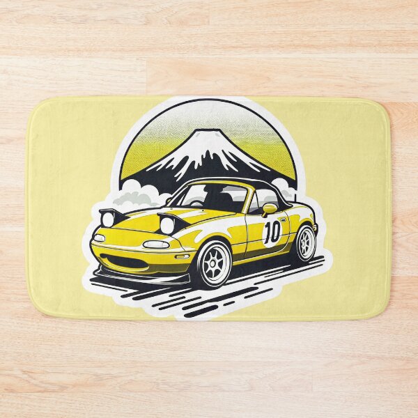 Item preview, Yellow Miata NA 10 in front of a mountain  designed and sold by mugooooo.