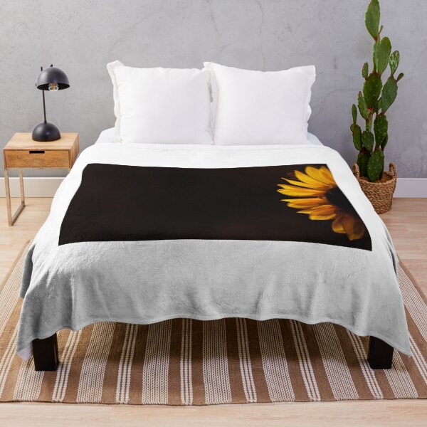 Item preview, Yellow sunflower in darkness with light shining through its petals designed and sold by Amanda Creamer.